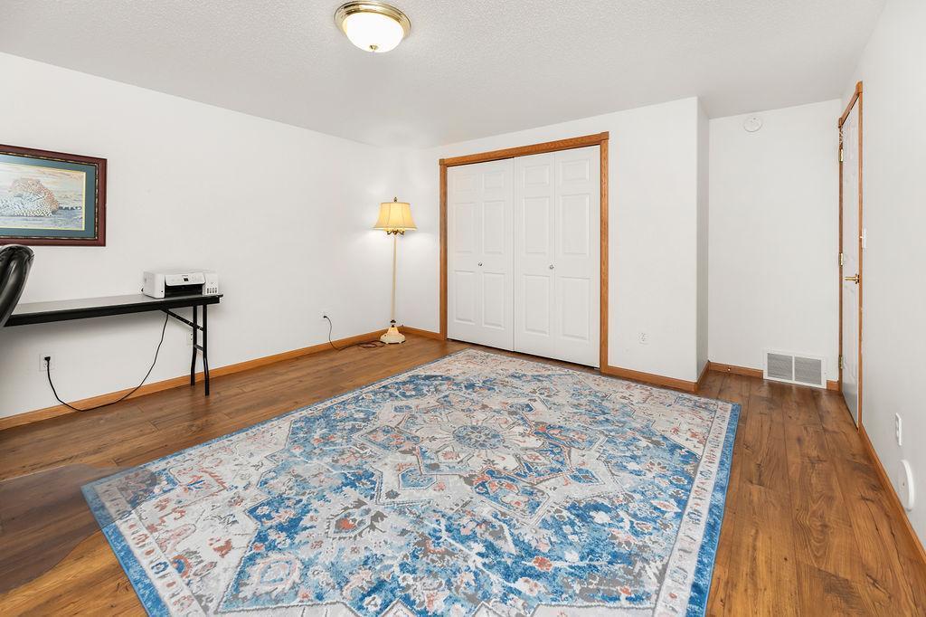 Bedroom 3, bright and spacious, large closet, plank floors.