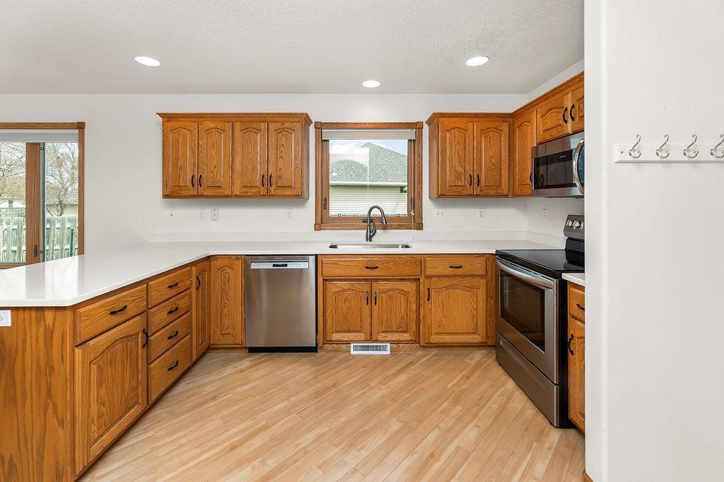 Stone countertops, Stainless appliances.