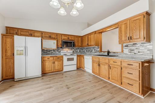 Spacious and sunny kitchen with ample workspace
