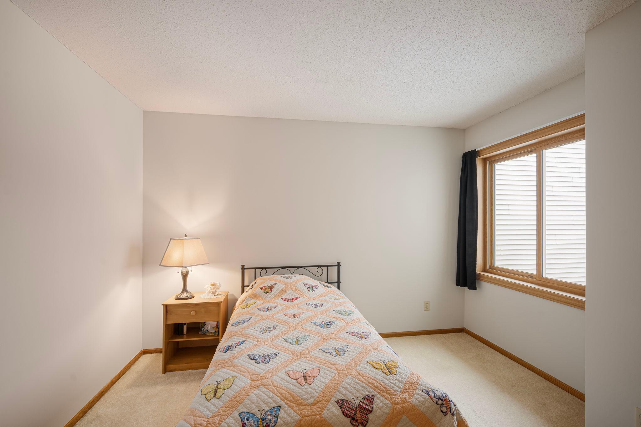 A second bedroom on the upper level, Both bedroom have newer window.