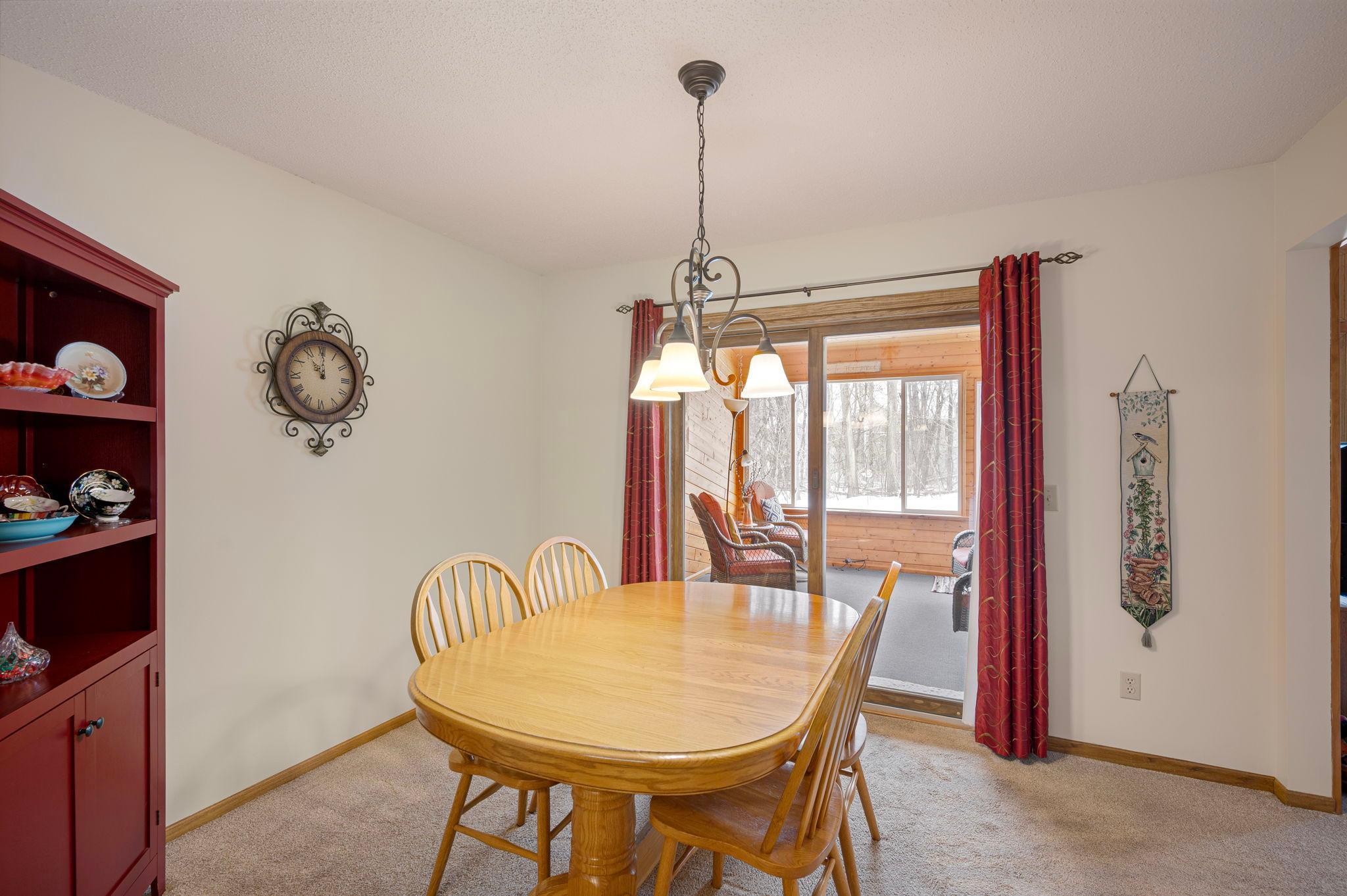 Separate dining room is open to the kitchen and living room plus the beautiful 3 season porch