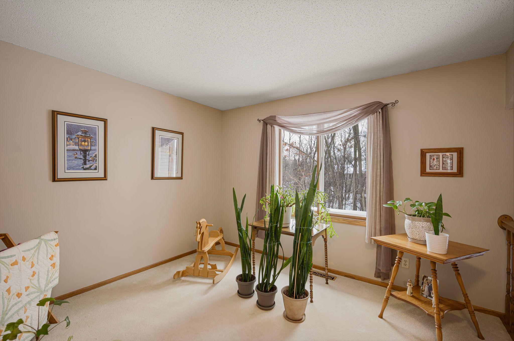 The upper level loft for additional living space for any way you want to use it.