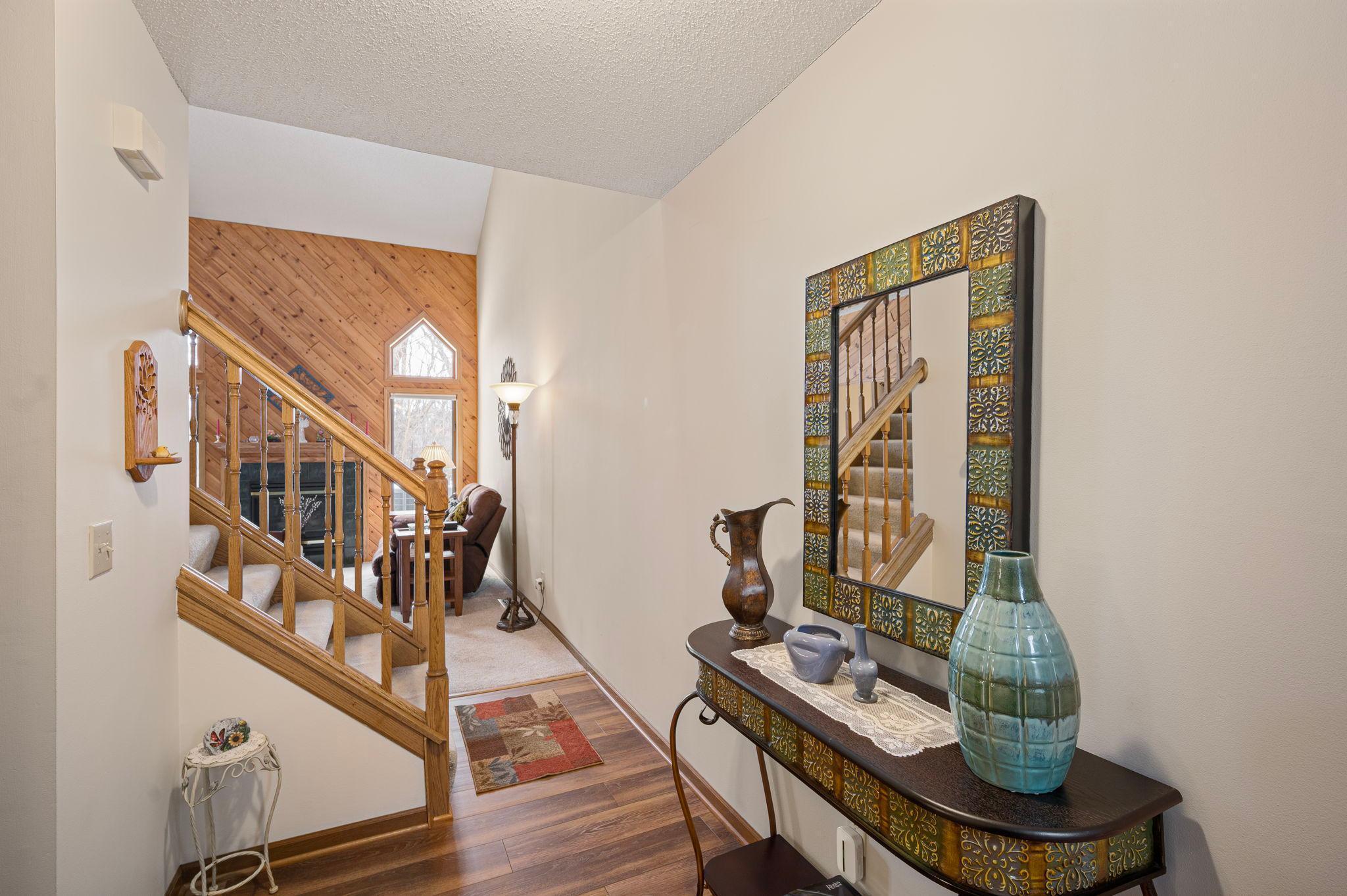 A large entry way that can lead you into your living room or a quick turn down the hallway to the kitchen.