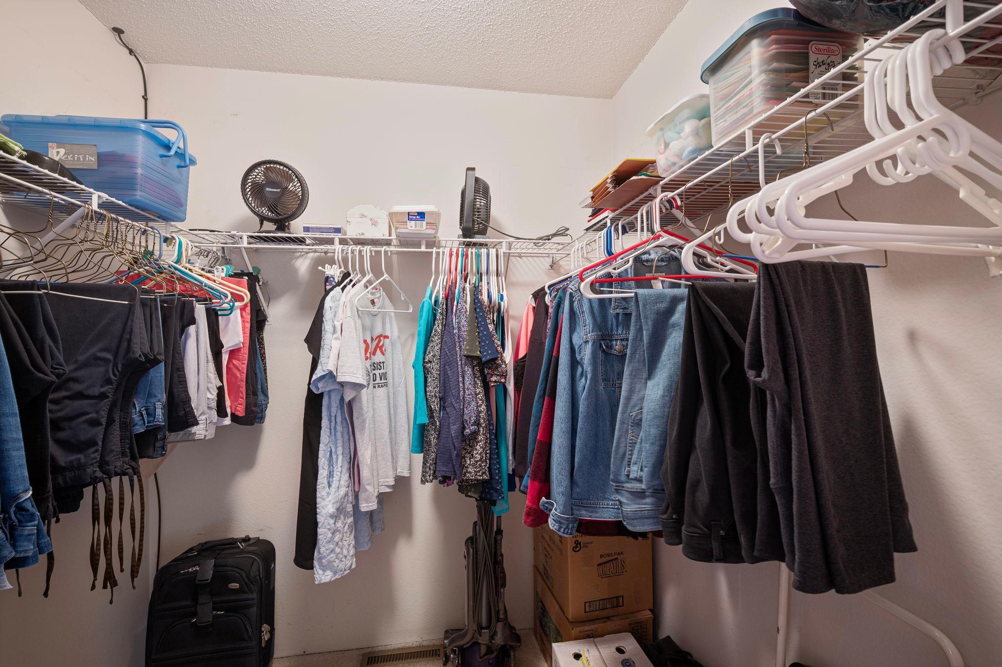 Large walk in closet for the primary bedroom.