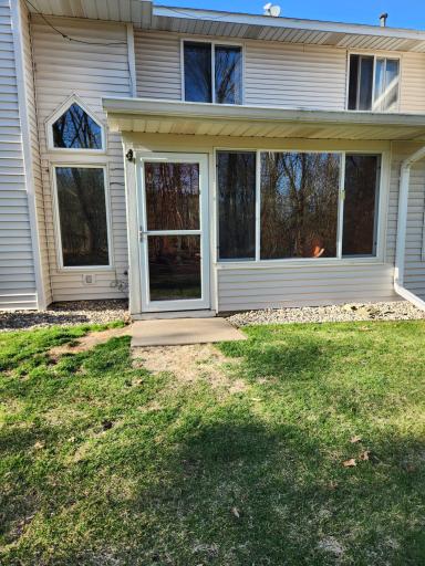 Walk out to your private back yard from the 3 season porch