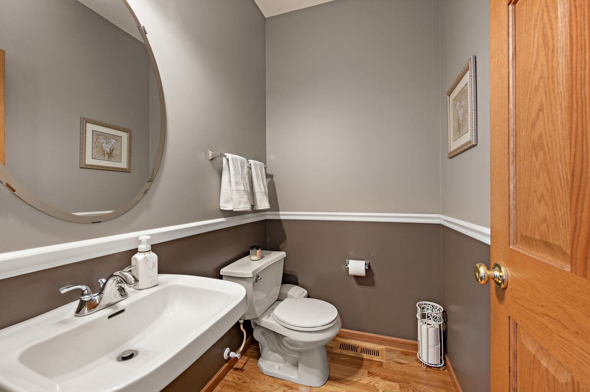 Main Floor 1/2 bath with hardwood floors!