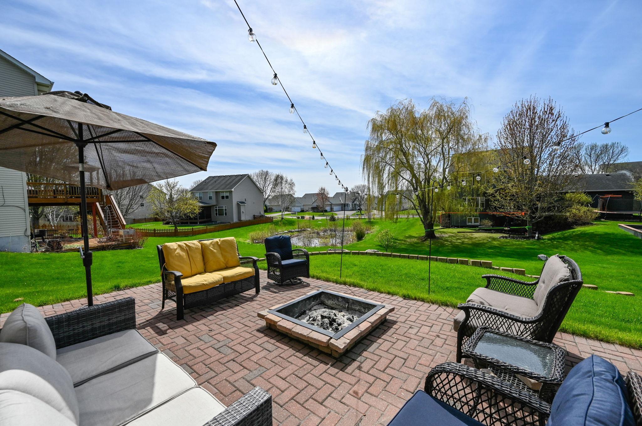 Step outside to enjoy the back patio or relax on the beautiful stamped concrete front patio