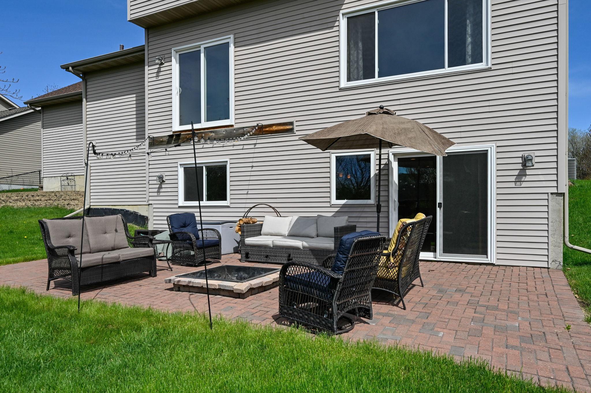 Step outside to enjoy the back patio or relax on the beautiful stamped concrete front patio