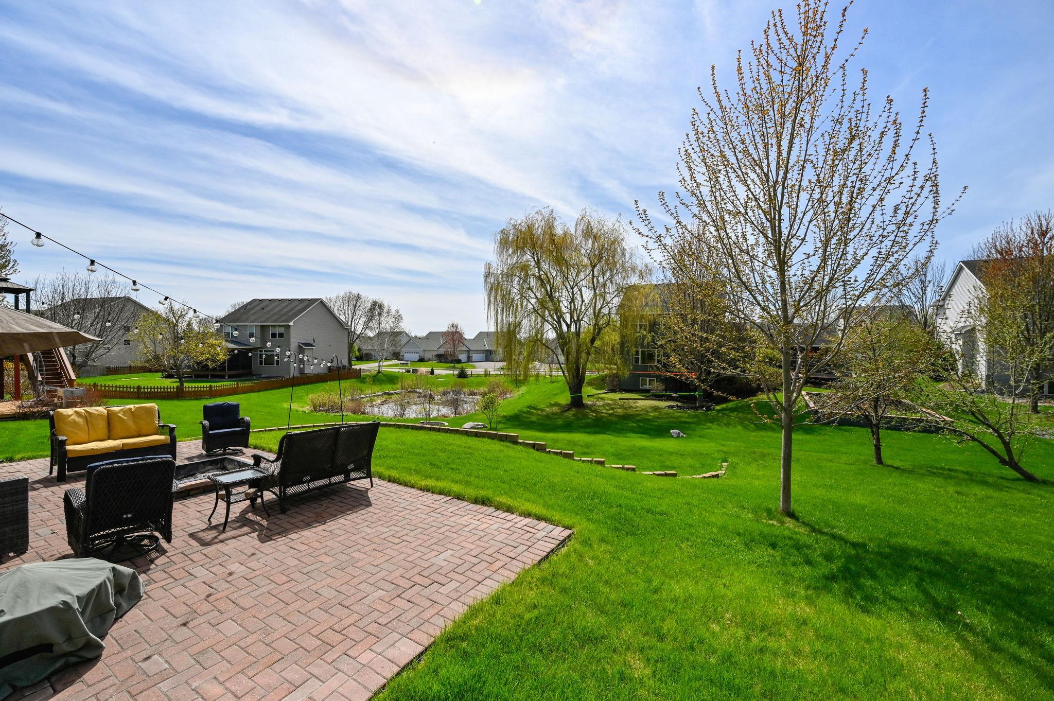 Step outside to enjoy the back patio or relax on the beautiful stamped concrete front patio