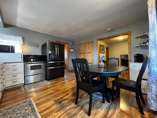 Kitchen with view of appliances, pantry and view of the office/dining room.