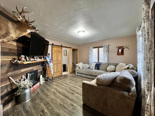 Cozy Living Room with Accent Wall & Fireplace