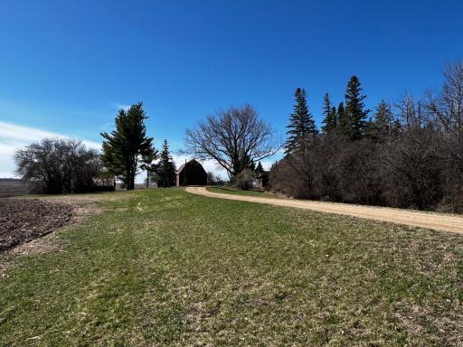 This farm site is settled back from Hwy 67 for a private country setting!