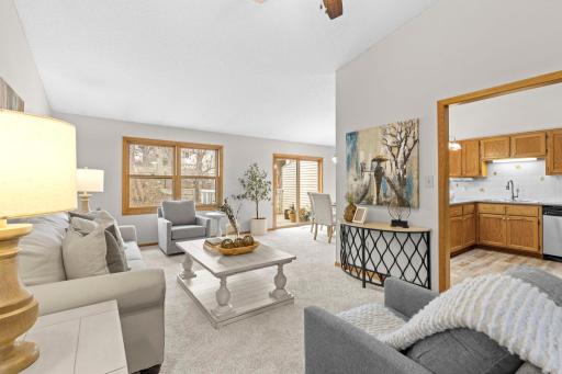 Spacious living room with backyard views and a flexible layout.