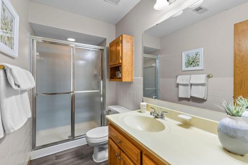 Â¾ bath located on lower level, complete with walk-in shower.