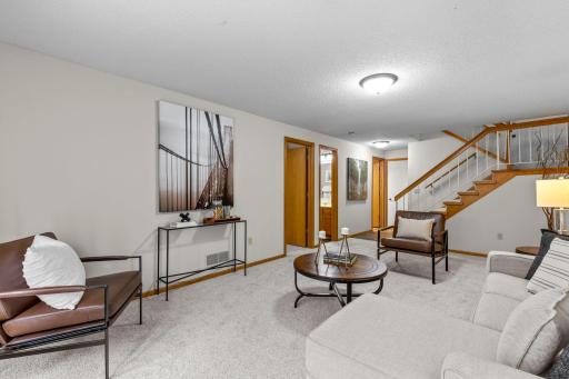 Featuring access to the attached two-car garage from the lower level.