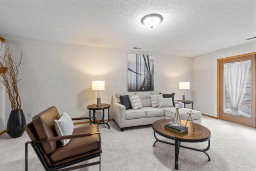 Bright family room with plenty of space and a flexible layout.
