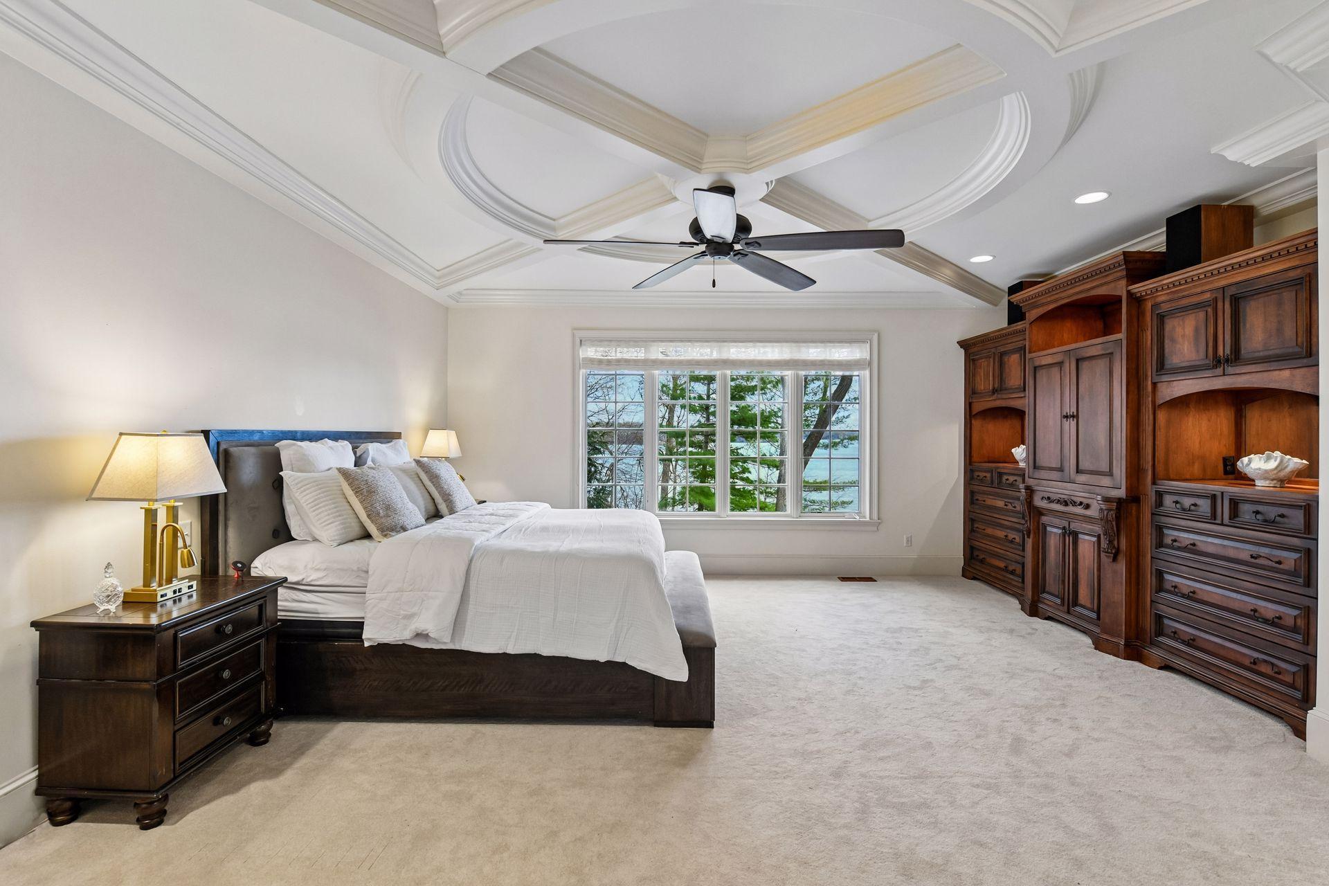 Sprawling, Main Level Primary Suite offers amazing views of Lake Minnetonka. Great way to wake up!