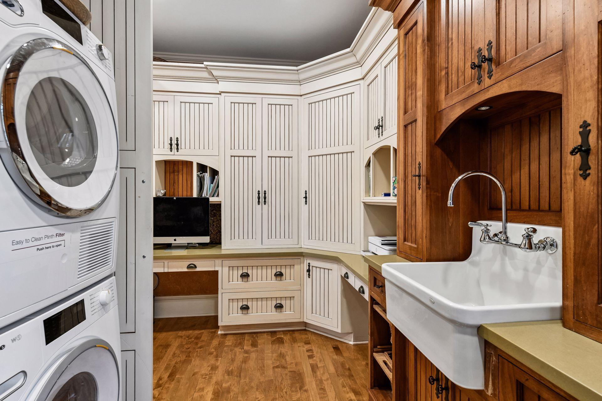 Large farmers sonk is ideal in this spacious laundry room