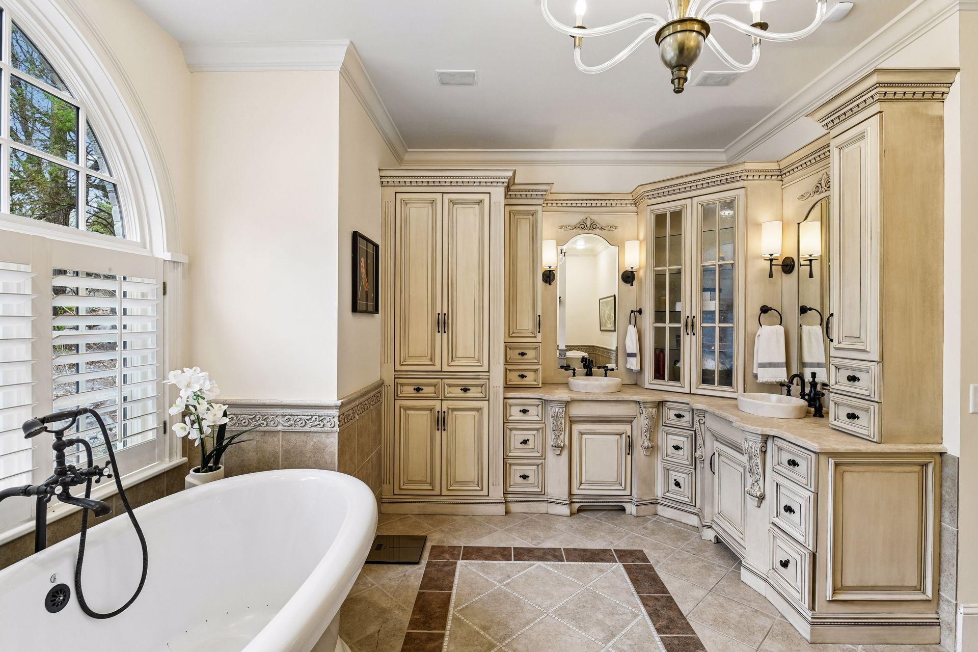Ornate custom cabinetry is simply divine.