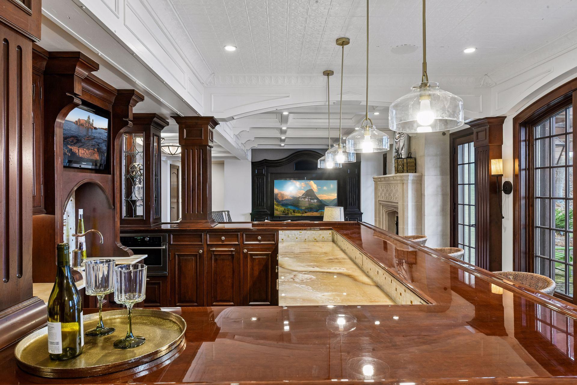 The view from the far end of the custom bar and step outside for a sip and enjoy the view of the lake.