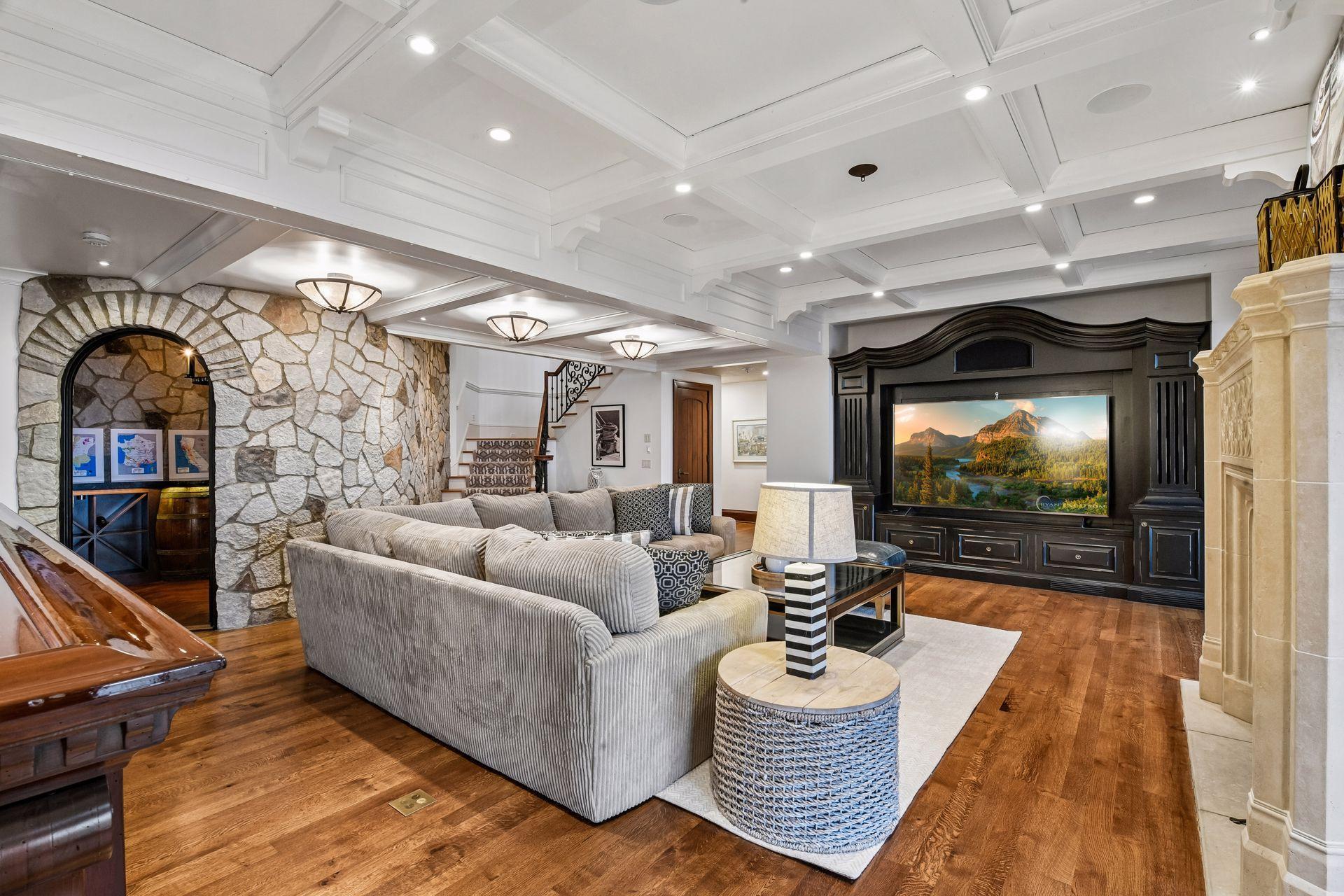 Impressive, custom wood framed television sets the tone everyday~