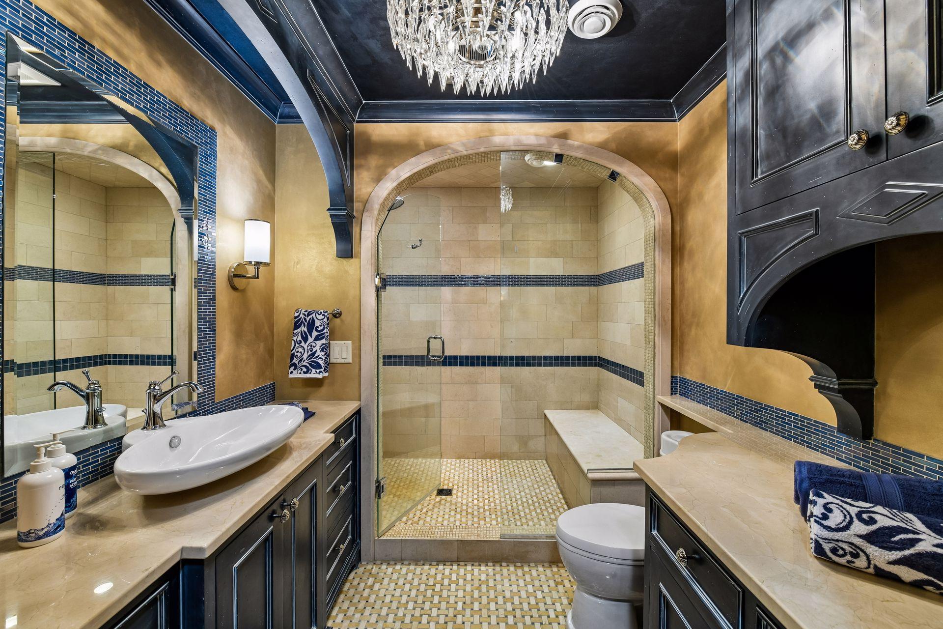 Gorgeous! The detail in this beautifully decorated and designed Lower Level Bathoom is beyond special