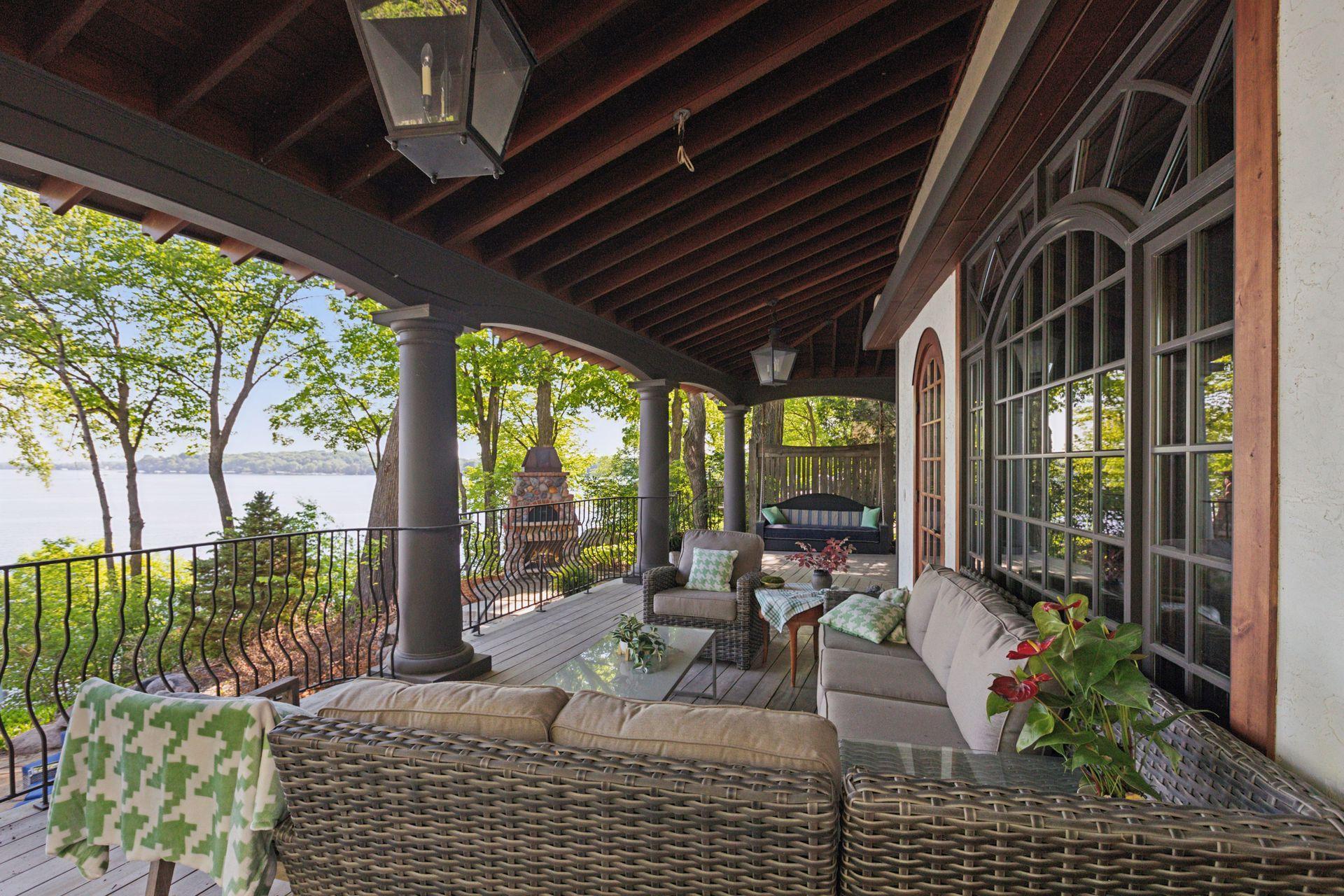 Large wrap-around door deck with sensational views of Lake Minnetonka all day long!