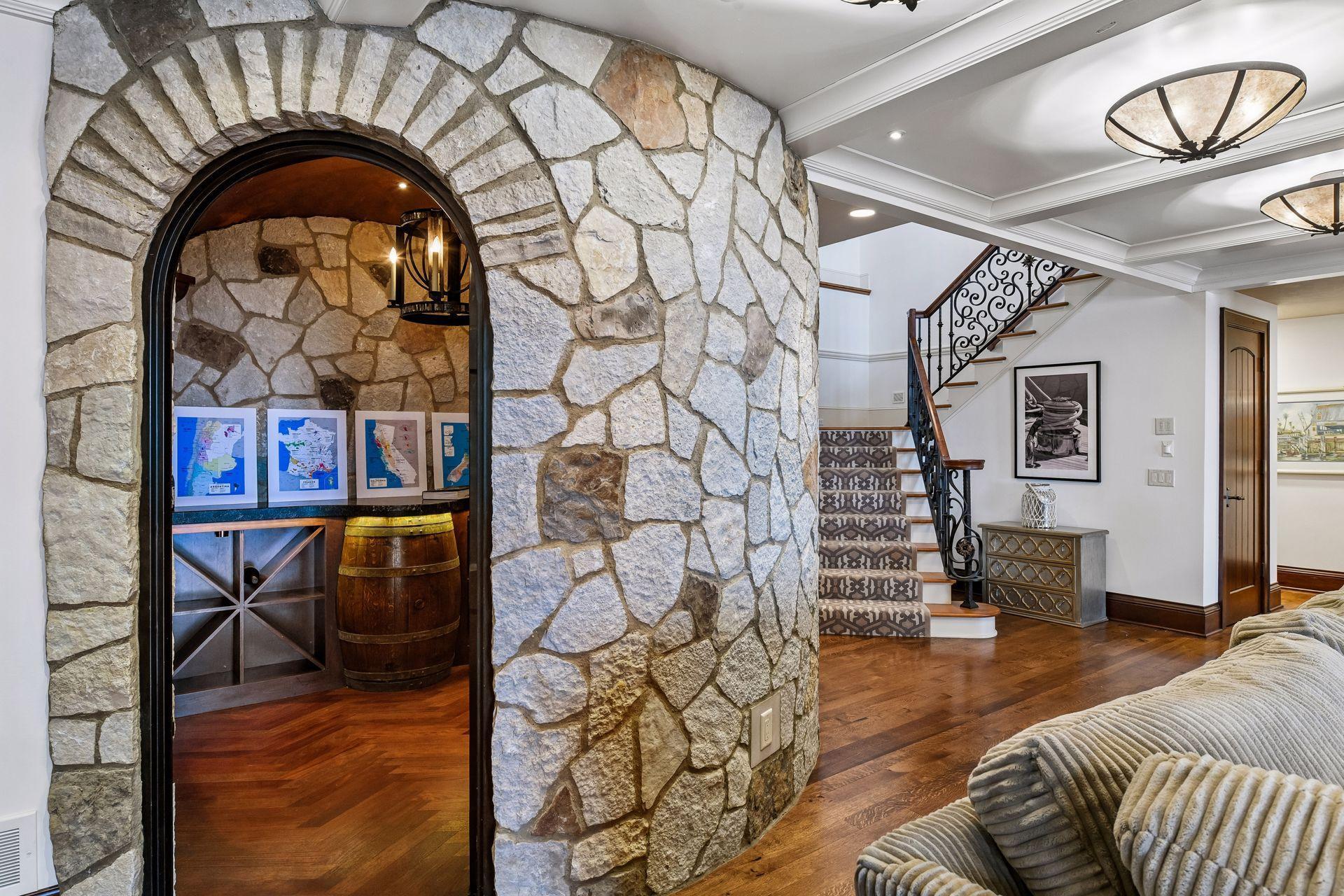 Entering the amazing stone wall wine celler