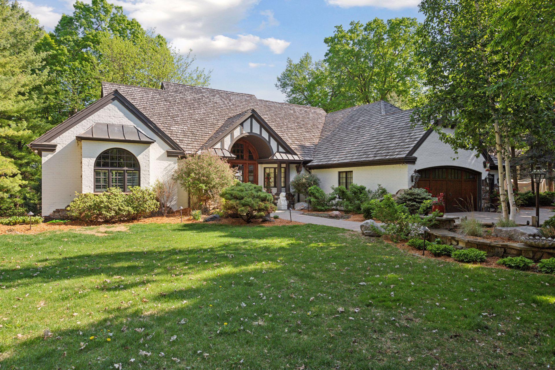 Storybook experience from driveway entrance to the home.