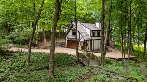 Pass by the carriage house w garage below, and guestroom/guest bathroom)on the way to the main house.