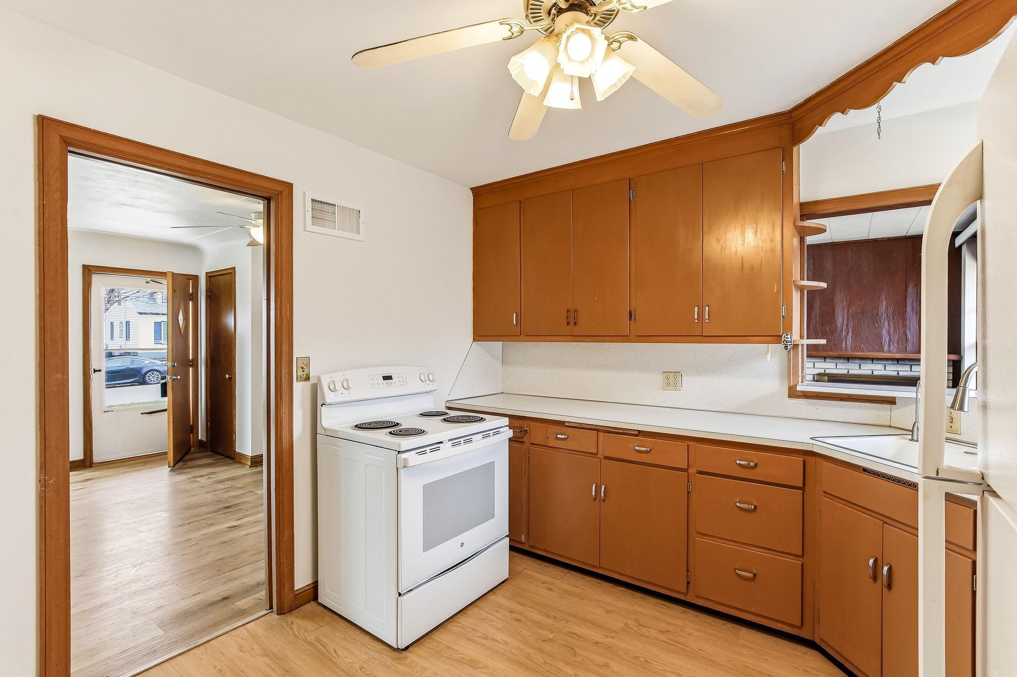 Kitchen with cutout to the family room