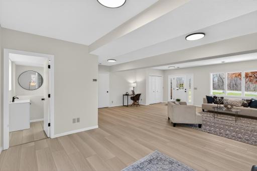 Lower level: family room + bonus area for office or extra sitting area. 3/4 bathroom