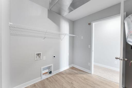 An upstairs laundry room is super convenient.