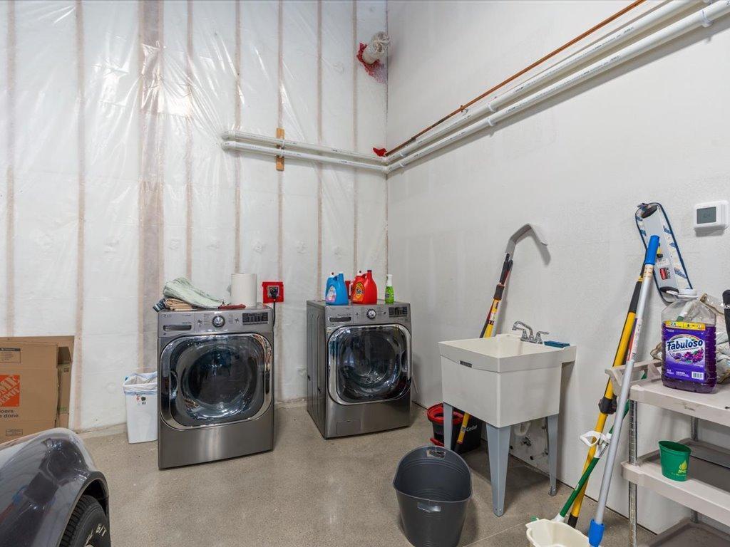 Washer/dryer in attached heated garage.