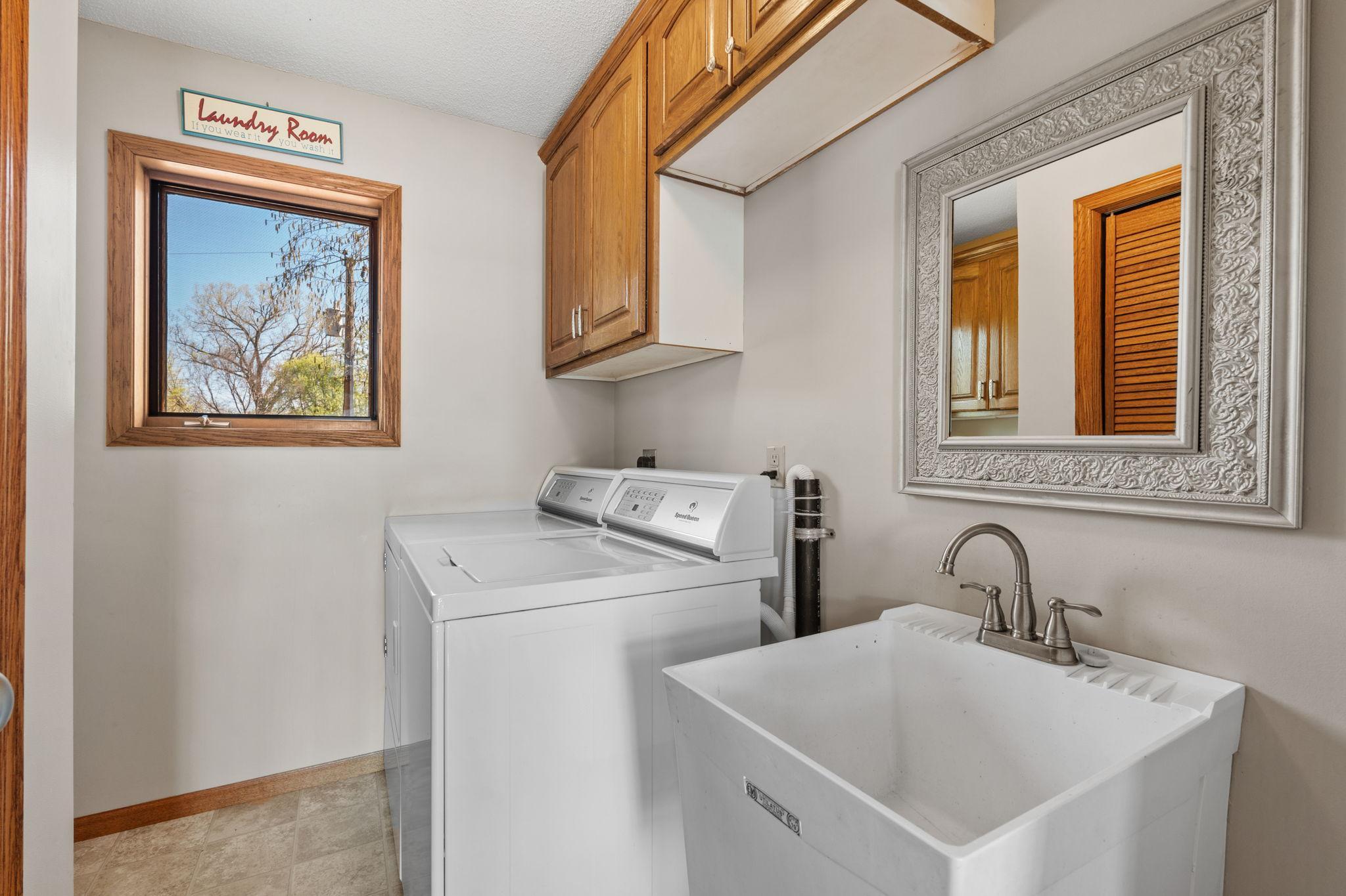 Conveniently located upstairs, the laundry room adds efficiency to everyday living.