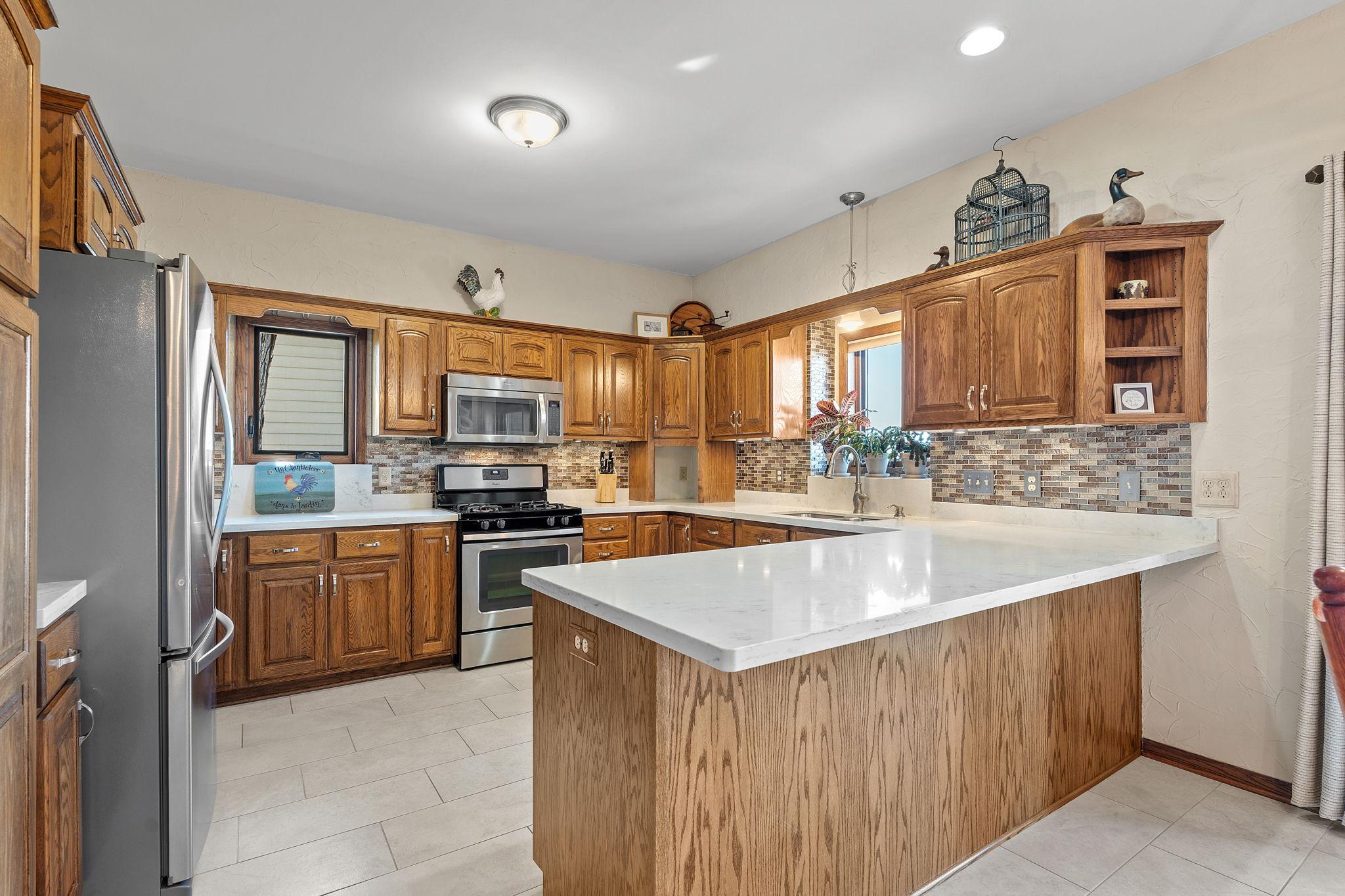 The kitchen is designed to impress, offering a welcoming space for cooking and gathering.