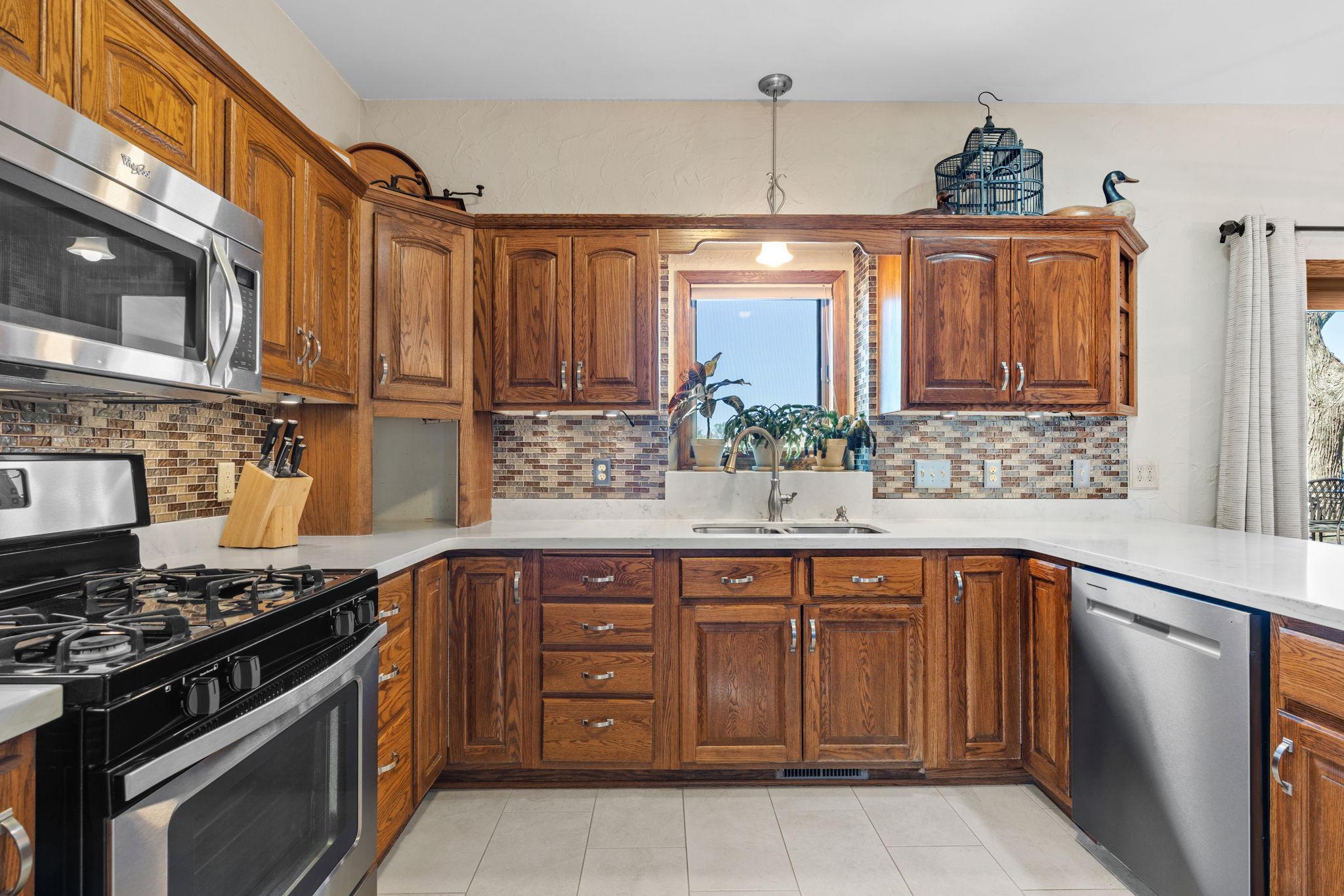 Beautiful cabinetry provides both style and storage, making the kitchen as functional as it is attractive.