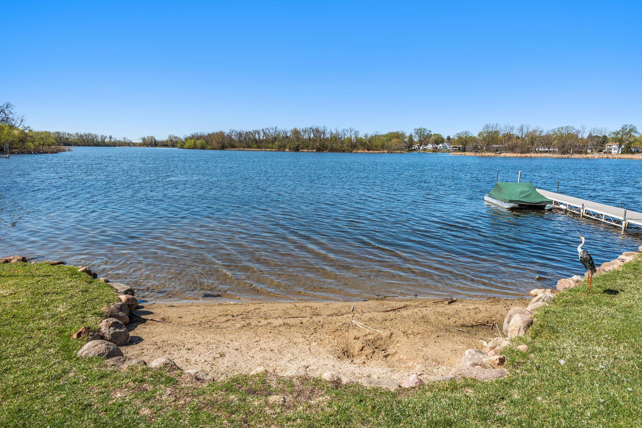 Enjoy direct views of Upper Twin Lake from your backyard, creating a peaceful and scenic everyday experience.