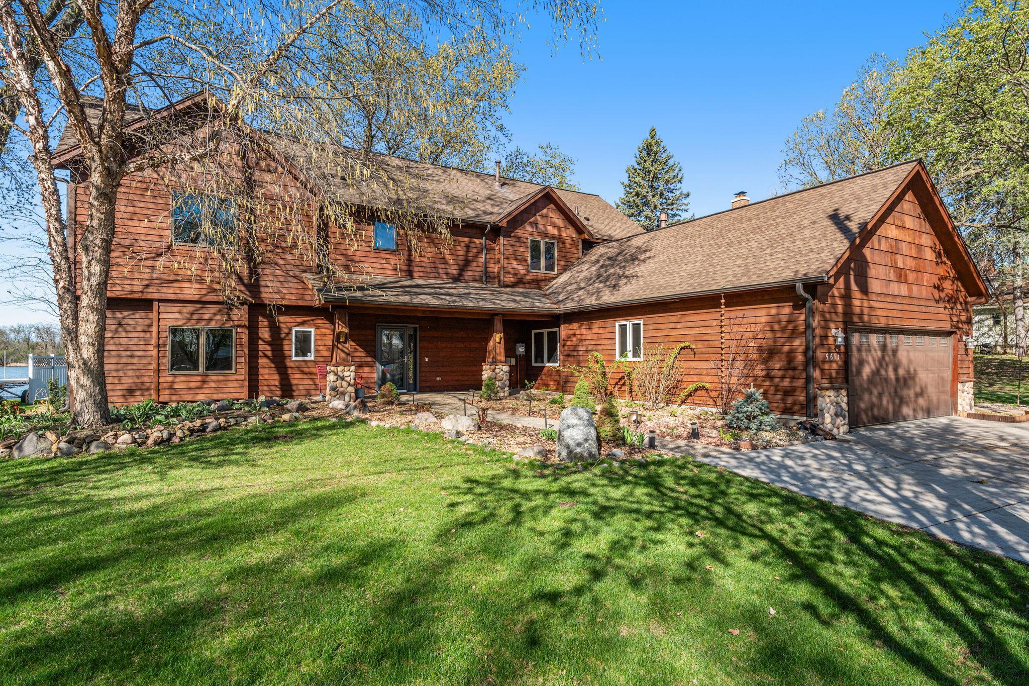 Welcome to this stunning Upper Twin Lake home!