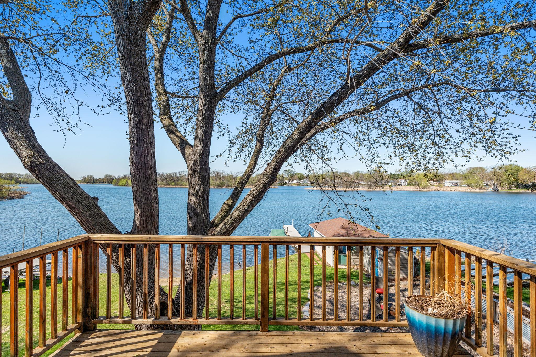 The upper deck offers beautiful views of the lake, creating a peaceful spot to unwind and enjoy the scenery.