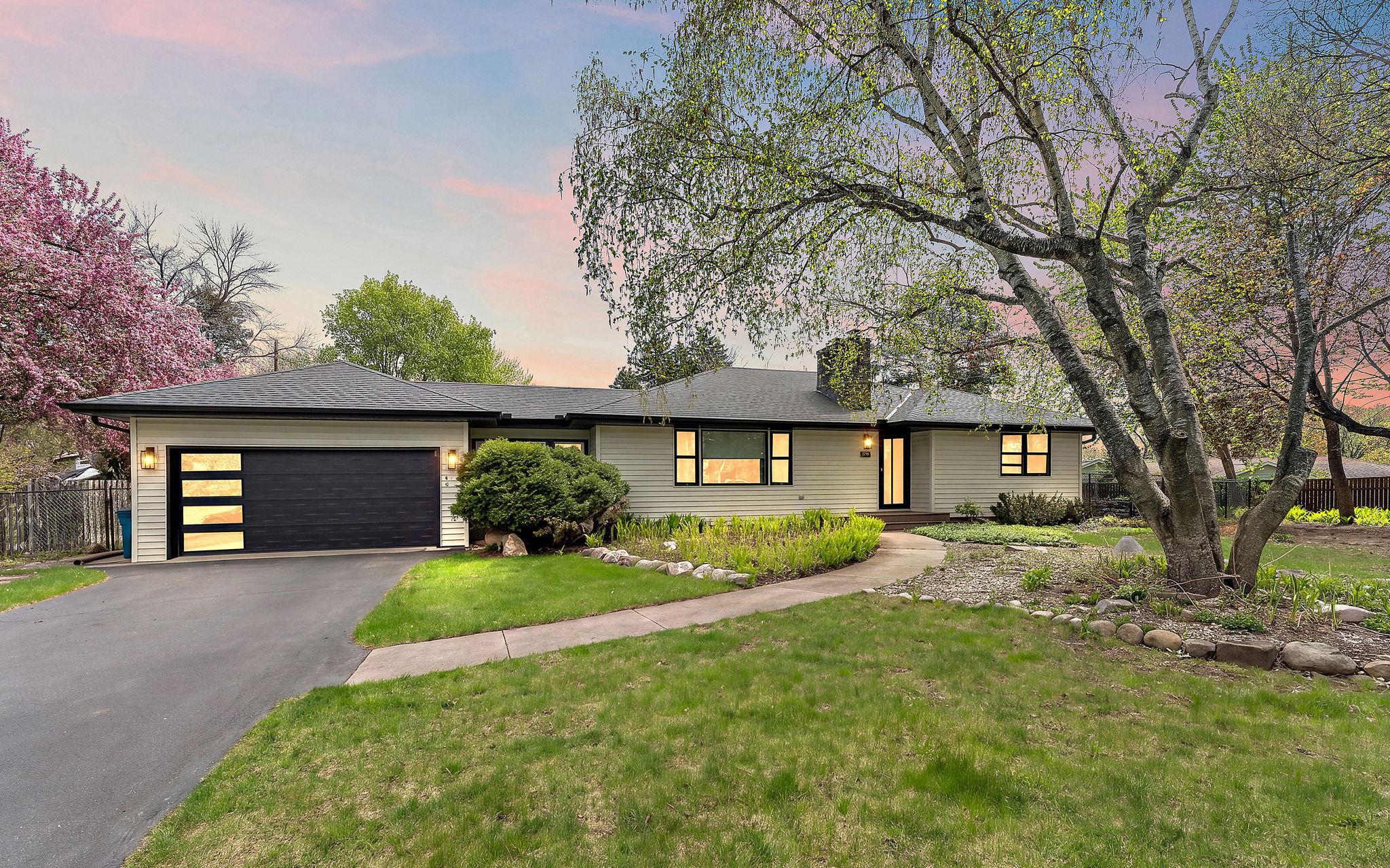 This home is an MCM in its roots, with a 14'x44' foot addition bringing it into the modern age.