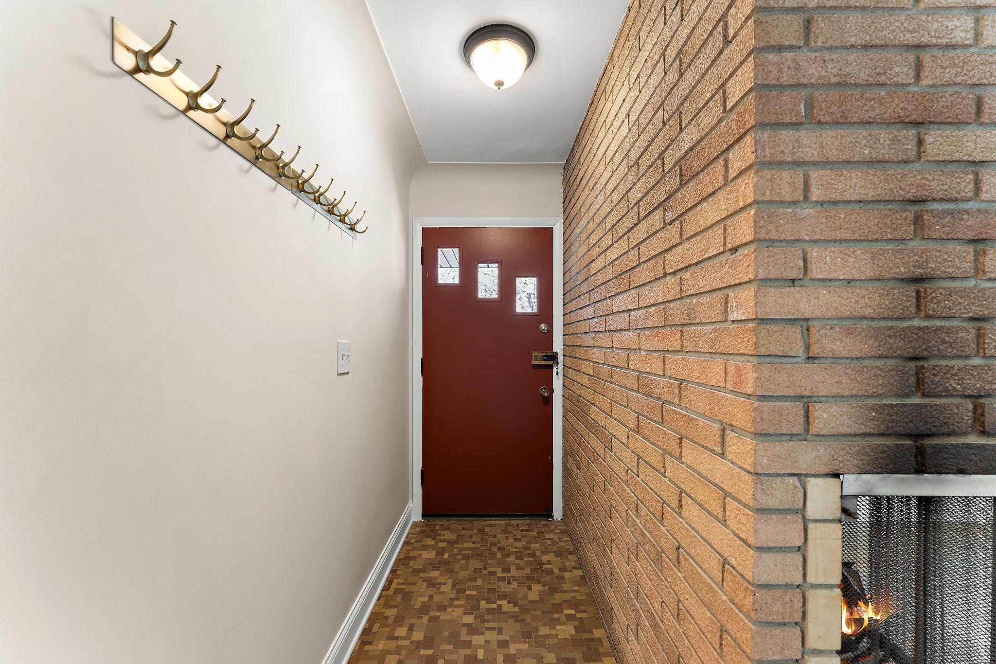 Original Mid-Century flooring in the foyer.