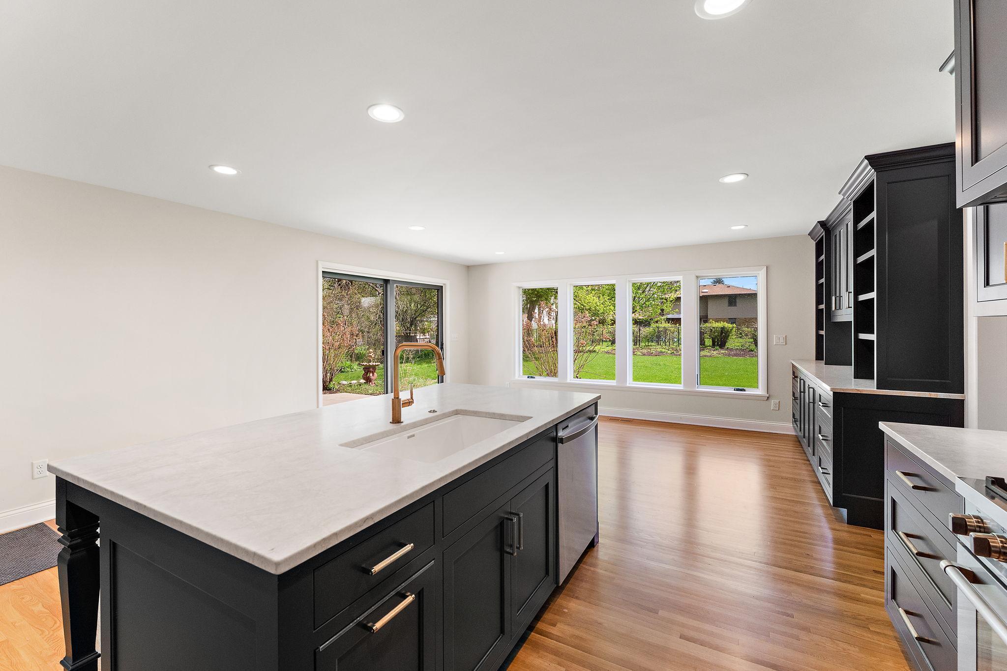 Beautiful new Marvin windows & doors overlooking the lush backyard.