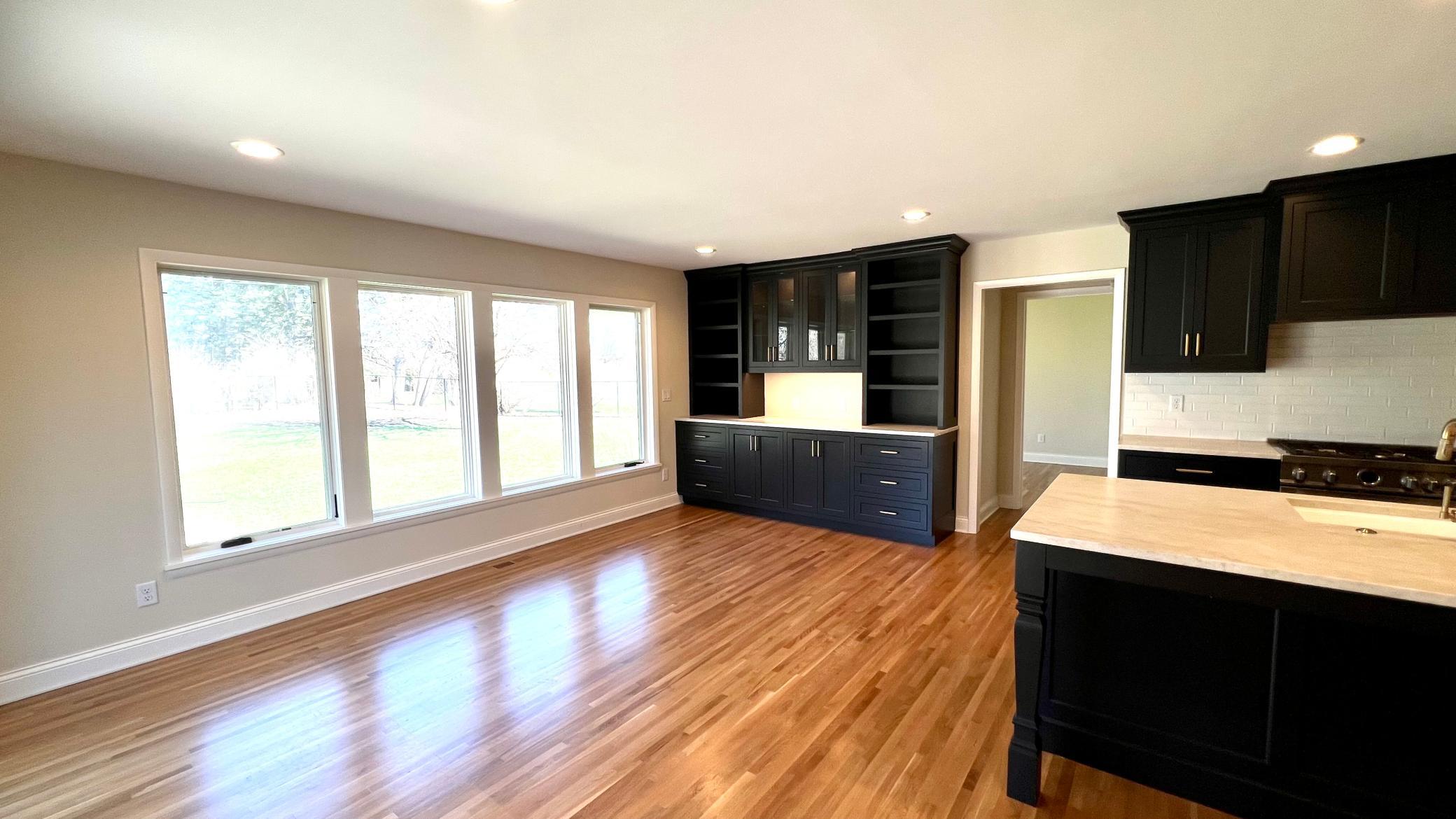 All new flooring in the addition blends seamlessly with the original 1955 oak flooring.