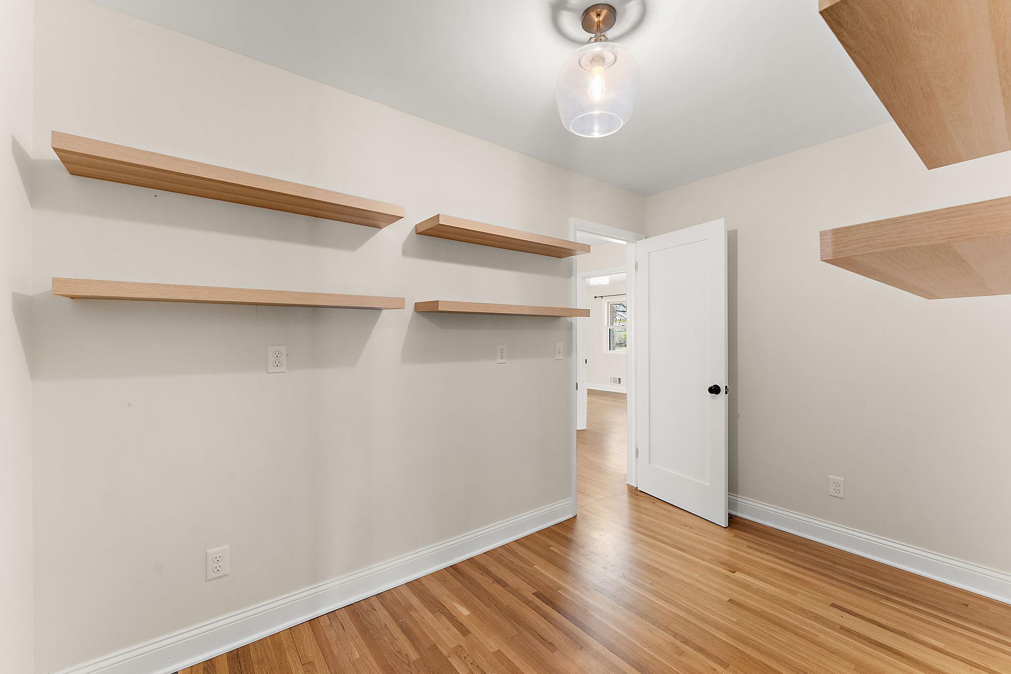 The shelving and new light fixture have stayed.