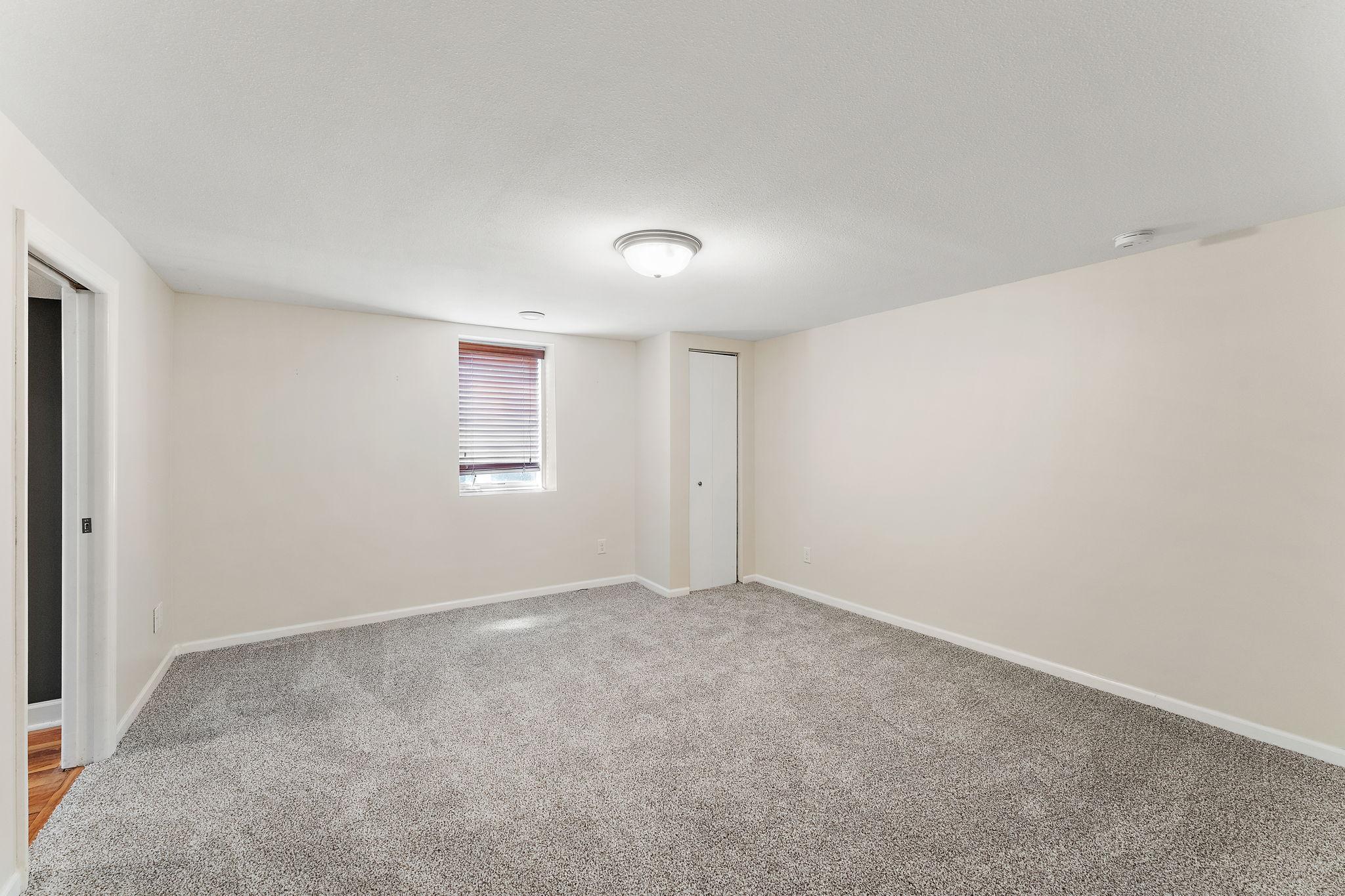 Unstaged first view of LL bedroom.