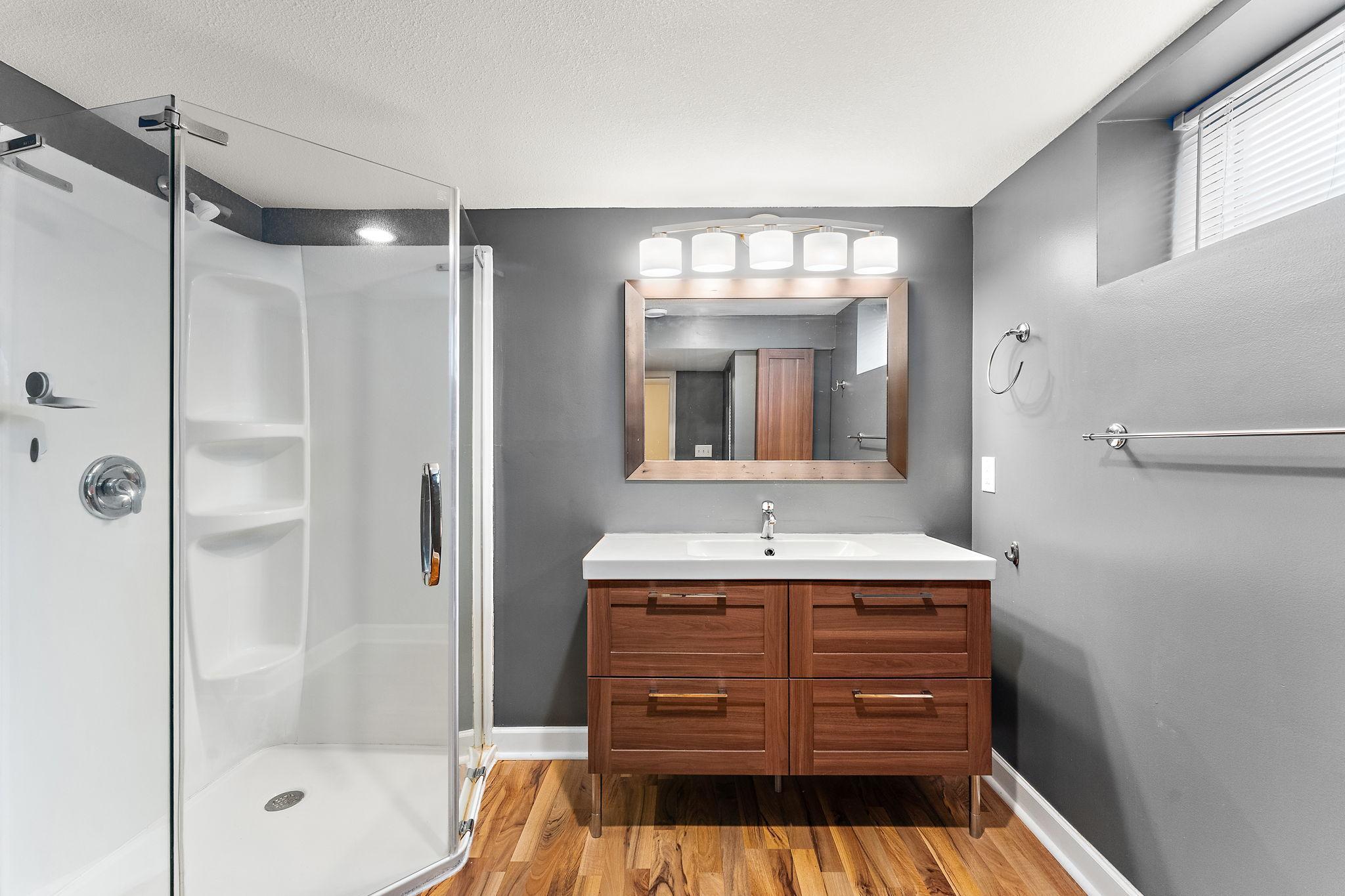 A closer look at the glass shower.