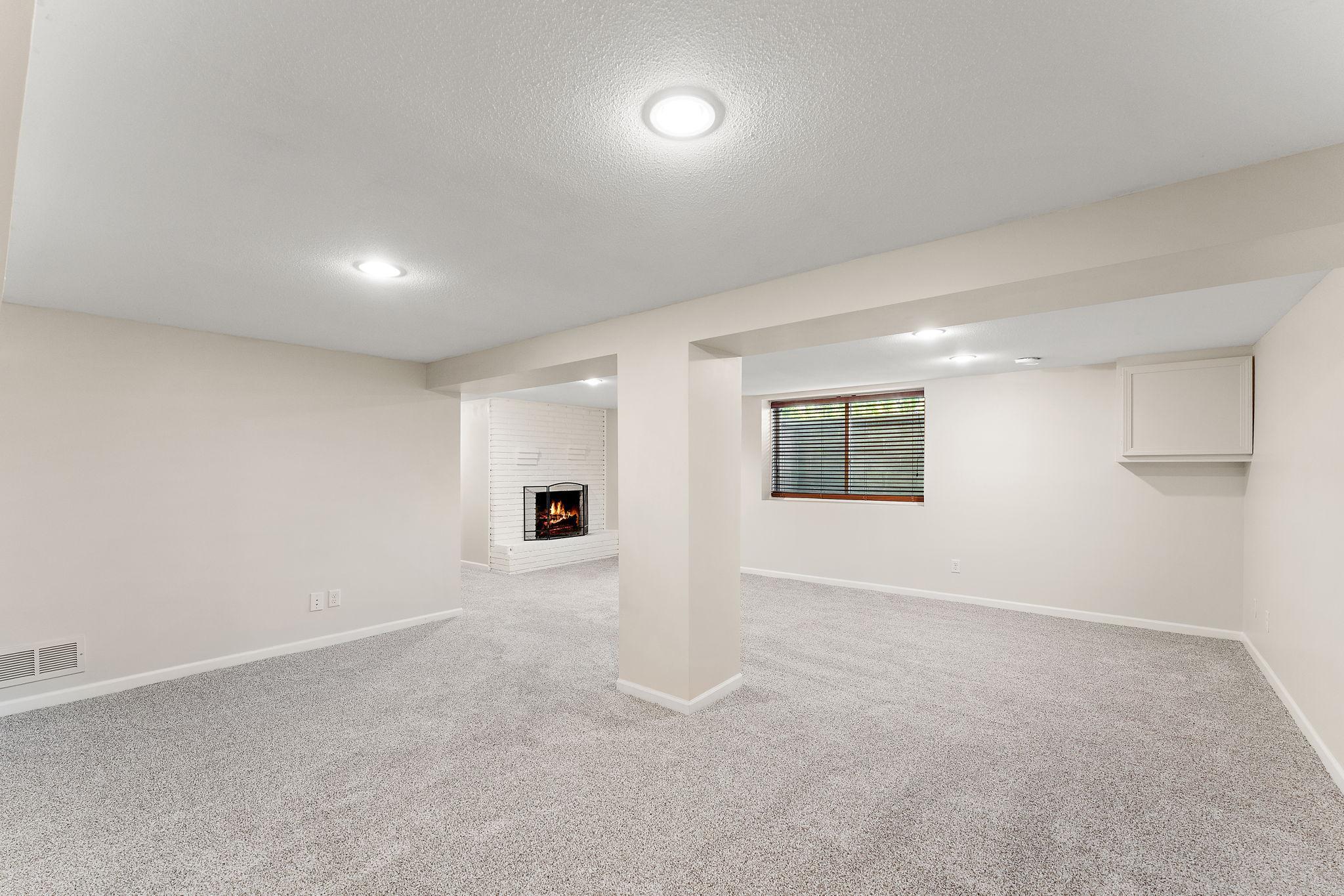 The lower level has a large daylight lookout window to allow a ton of natural lighting.