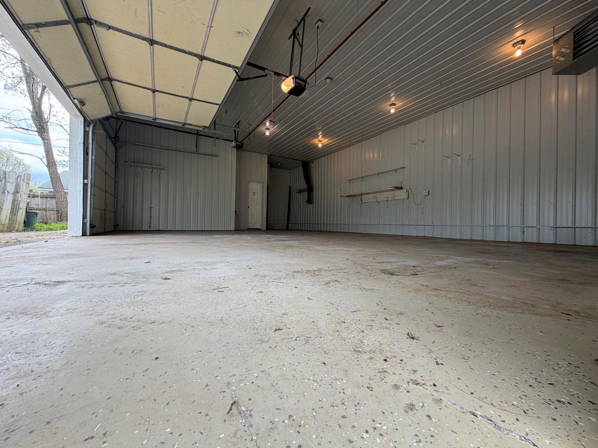 Interior Photo of Garage - this is perfect workshop or home based business.