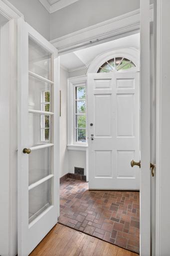 This home offers gleaming hardwood floors and stunning original millwork throughout.
